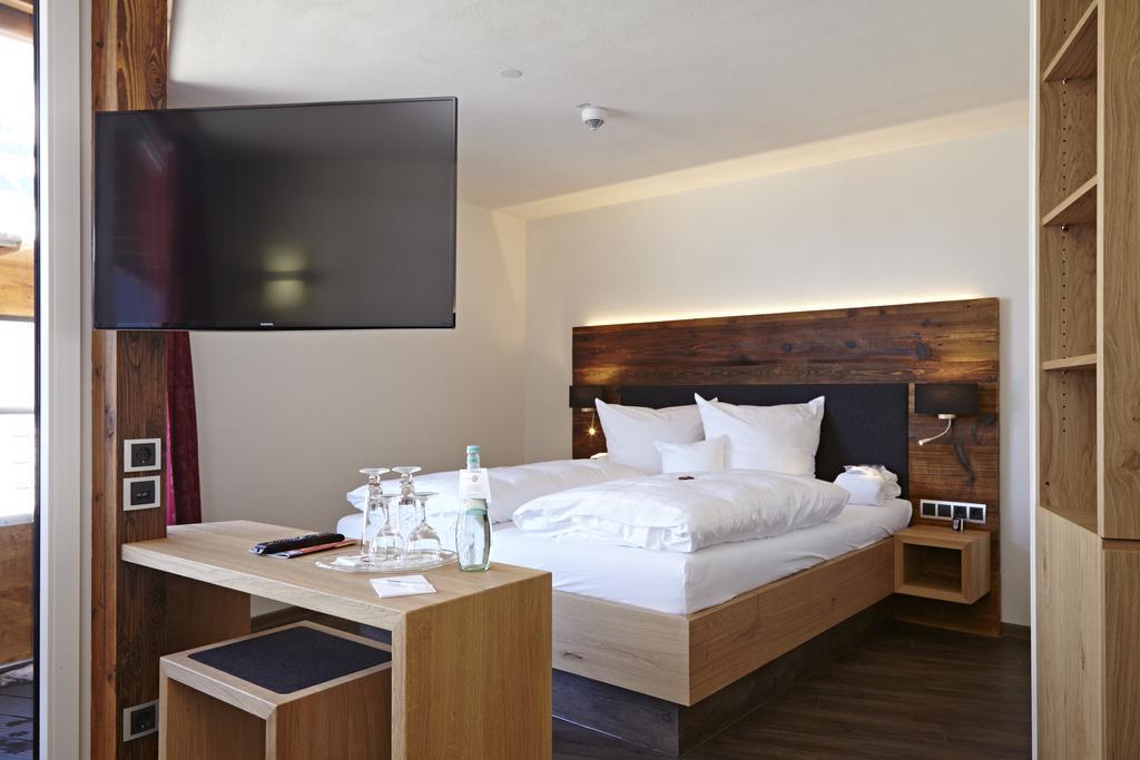 Hotel Garni Oberdorfer Stuben Obermaiselstein Rom bilde